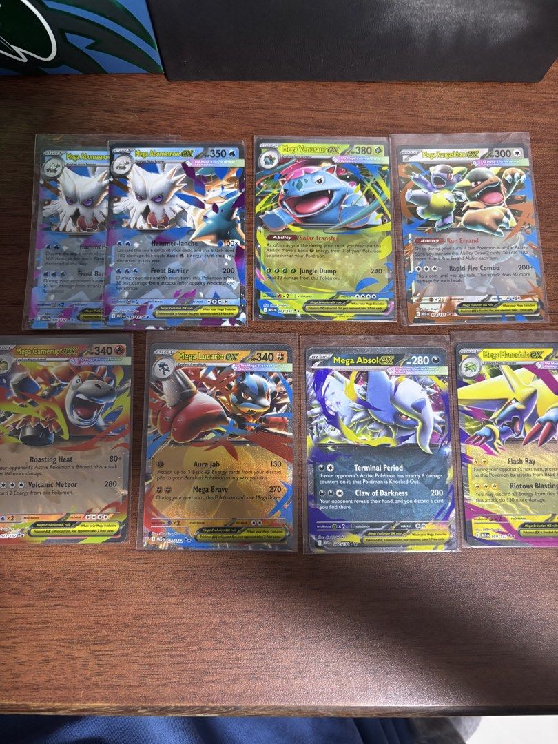 Assorted characters Mega Evolution card (Category: Raw Cards) located in Singapore. Submitted by meowsmeow (Listing ID 1451634638, Image 1). Description: Selling a collection of Mega Evolution Pokemon EX cards. Includes Mega Venusaur, Mega Charizard, Mega Blastoise, Mega Absol, Mega Gengar, and Mega Lucario. All cards are in protective sleeves. Great additions for any Pokemon trainer's collection. Grab these powerful EX cards now!.
