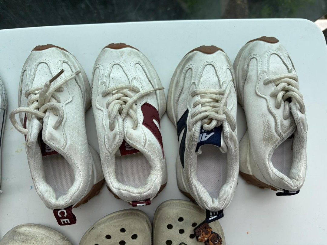 Assorted Kids Shoes - Converse, Crocs, Sneakers (Category: Babies & Kids Fashion) located in Mandaluyong City. Submitted by derekalava (Listing ID 1451685856, Image 3). Description: - for saleBundle of kids' shoes see pics for the condition get all with free socks - Includes black & white Converse sneakers - White canvas sneakers with velcro straps - Various pairs of Crocs-style clogs - Some clogs feature fun character charms - Perfect for everyd