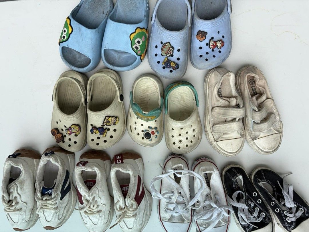 Assorted Kids Shoes - Converse, Crocs, Sneakers (Category: Babies & Kids Fashion) located in Mandaluyong City. Submitted by derekalava (Listing ID 1451685856, Image 2). Description: - for saleBundle of kids' shoes see pics for the condition get all with free socks - Includes black & white Converse sneakers - White canvas sneakers with velcro straps - Various pairs of Crocs-style clogs - Some clogs feature fun character charms - Perfect for everyd
