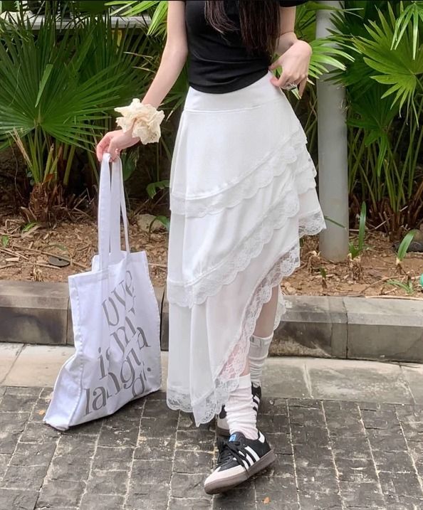 Asymmetrical Satin Tiered Skirt (Category: Skirts) located in Pasig City. Submitted by shopsmart.mnl (Listing ID 1451651017, Image 2). Description: 14" laid flat Garterized at the back and side zip No issues.