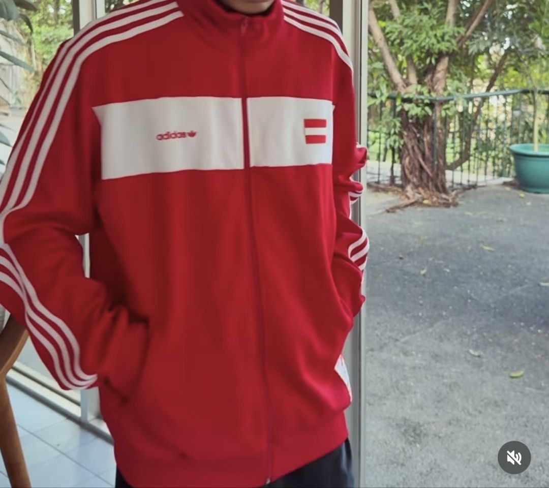 Austria Adidas Track Jacket Red (Category: Coats, Jackets and Outerwear) located in Quezon City. Submitted by lootboxlab (Listing ID 1451677349, Image 3). Description: - Red Adidas track jacket -20”x31” - White stripe details on sleeves - White chest panel with Adidas logo and Austria flag - 'AUSTRIA' printed on the back - Zip-up front closure - Two side pockets.