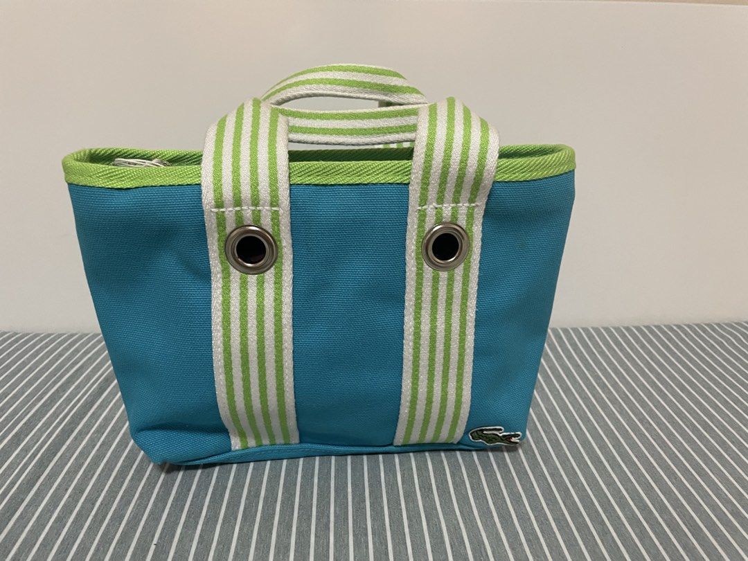 Authentic brandnew lacoste hang bag (Category: Luxury Bags & Wallets) located in Caloocan City. Submitted by prelovedbybets (Listing ID 1451534902, Image 1). Description: Brand new lacoste hand bag canvas material .
