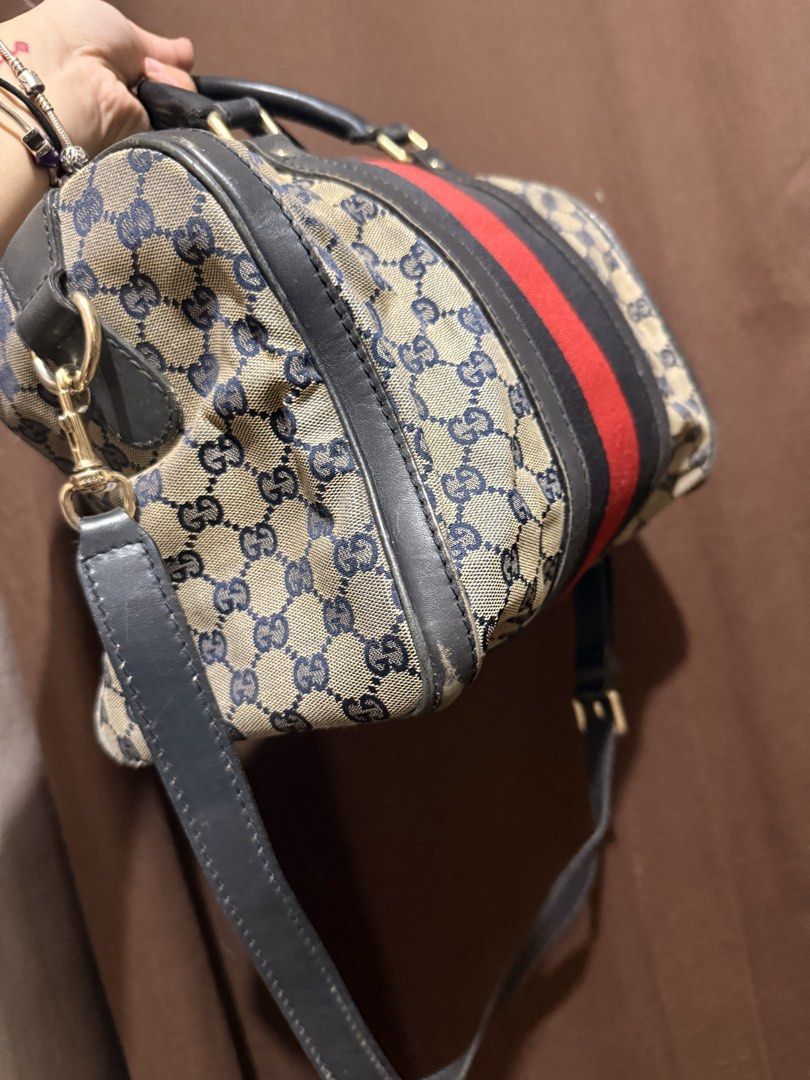 Authentic Gucci Monogram Boston Crossbody Bag (Category: Luxury Bags & Wallets) located in Quezon City. Submitted by lovedbyry (Listing ID 1451547743, Image 3). Description: - Classic Gucci Boston bag - Iconic GG monogram canvas -Original and Authentic Bought at around 35,000 What you see is what you get. Well loved piece but still looks presentable. Rubs on lining and signs of use as seen on the picture. Stains also on interior of the bag but yo