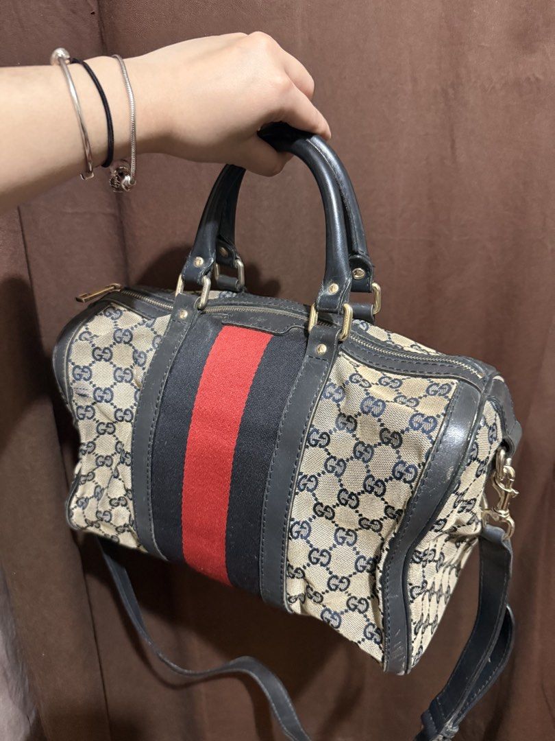 Authentic Gucci Monogram Boston Crossbody Bag (Category: Luxury Bags & Wallets) located in Quezon City. Submitted by lovedbyry (Listing ID 1451547743, Image 2). Description: - Classic Gucci Boston bag - Iconic GG monogram canvas -Original and Authentic Bought at around 35,000 What you see is what you get. Well loved piece but still looks presentable. Rubs on lining and signs of use as seen on the picture. Stains also on interior of the bag but yo