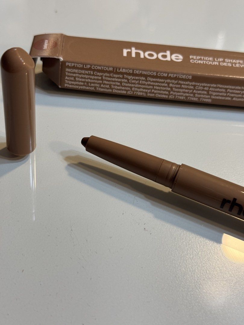 AUTHENTIC RHODE LIP SHAPE IN BALANCE (Category: Makeup) located in Quezon City. Submitted by declutteringella (Listing ID 1451631119, Image 2). Description: NEVER BEEN USED LAST PRICE POSTED SHADE IN BALANCE RFS: DECLUTTERING.