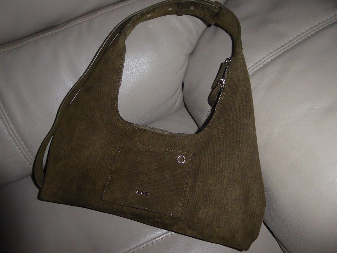 Aztrid Small Crossbody Hobo Sling Strap Bag (Category: Shoulder Bags) located in Paranaque City. Submitted by declutterbyrosie (Listing ID 1451687320, Image 2). Description: Selling Suede Moss Colored - Aztrid Cross Body Hobo Sling Strap Bag - no issues - lightly used - selling lower than actual paid price RFS: decluttering.