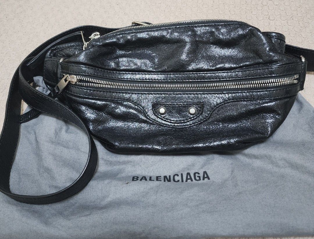 Balenciaga Black Leather Belt Bag (Category: Luxury Bags & Wallets) located in Quezon City. Submitted by deng43763 (Listing ID 1451650291, Image 1). Description: - Authentic Balenciaga black leather belt bag - Multiple zippered compartments for organization - Adjustable strap with buckle closure - Distinctive slightly crinkled leather texture - Silver-tone hardware - Comes with original dust bag.