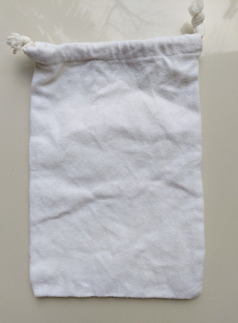 Bottega Veneta Dust Bag (Category: Luxury Bags & Wallets) located in Lapu Lapu. Submitted by agnesapm_29813 (Listing ID 1451650382, Image 3). Description: - Authentic Bottega Veneta dust bag - Made from 100% eco-friendly cotton flannel - Perfect for storing wallet, small accessories or jewelry - Made in Albania - Measurements: width-6 inches, height-9 inches .