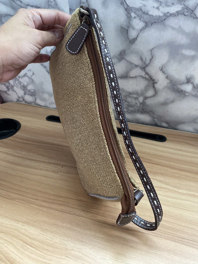 Brown Tweed Shoulder Bag with Leather Trim (Category: Shoulder Bags) located in Caloocan City. Submitted by izzyjelly (Listing ID 1451626140, Image 3). Description: Cute little shoulder bag. Brown tweed material with brown leather trim. Zipper closure. Inside has a zippered pocket. Small and compact, great for essentials. Perfect size for a quick outing..