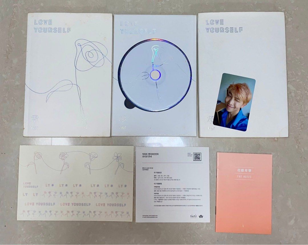 BTS Love Yourself 'Her' Album - L (Category: K-Wave Merchandise) located in Manila. Submitted by mermaidgalinda_ (Listing ID 1451538681, Image 1). Description: complete! but with issues (yellow stains, slightly damaged cover) includes: album, cd, photocard, stickers, booklet, and other inclusions (as shown in the photos).