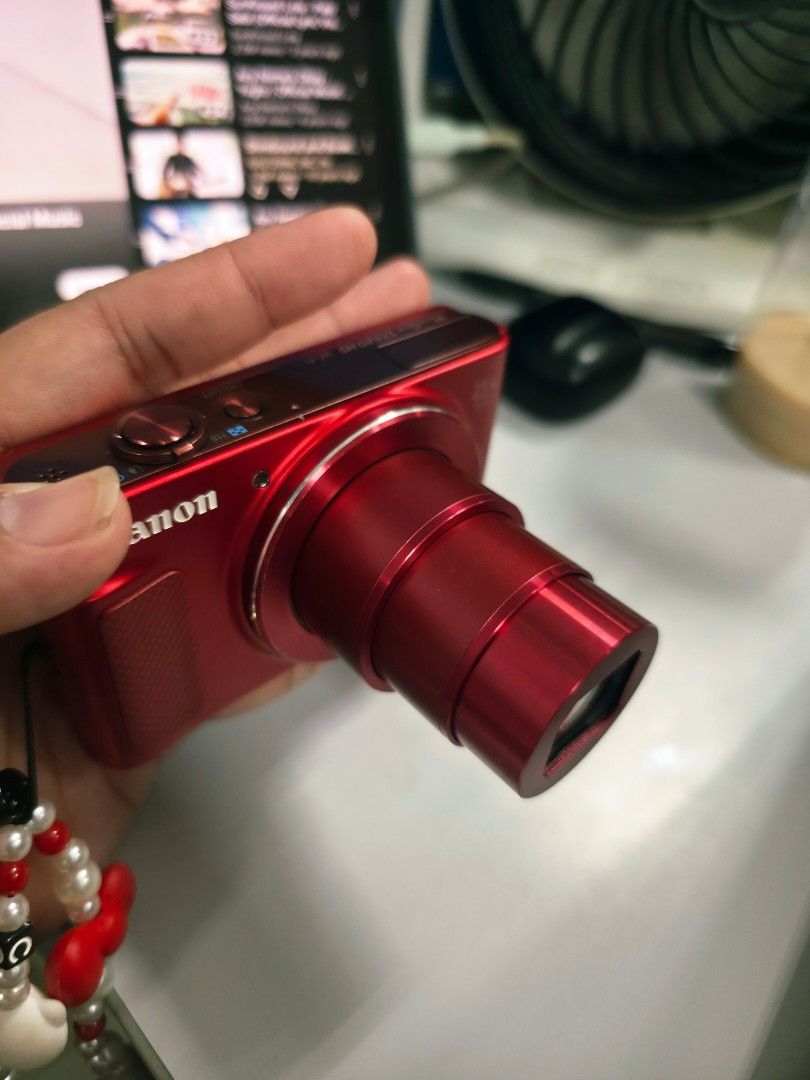 Canon Digital Camera - Red (Category: Cameras) located in Manila. Submitted by deverapatr00714 (Listing ID 1451577232, Image 2). Description: Canon Powershot SX620 HS Key Specifications ensor and Processor: 20.2 MP 1/2.3-inch BSI-CMOS sensor paired with a DIGIC 4+ image processor. Lens and Zoom: 25x optical zoom lens, extendable to 50x using ZoomPlus digital-progressive technology. Video: Records up to 1080p Full HD video at 30 fps in MP4 format.