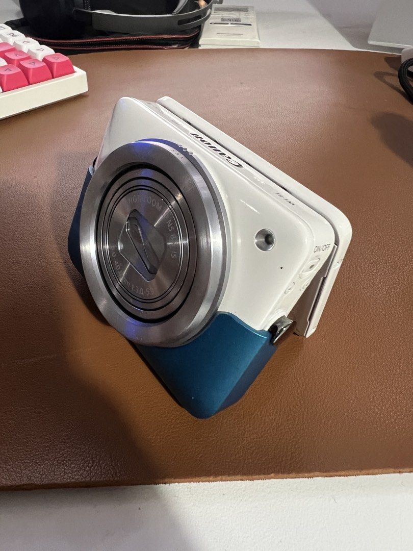 Canon N1Digital Camera (Category: Cameras) located in Paranaque City. Submitted by declutterbyrosie (Listing ID 1451691844, Image 2). Description: Selling my preloved Canon N Digital Camera (Slightly vignette - but no issues in output) Screen can be bought in the orange app Unito Original Battery Original Charger SD card.