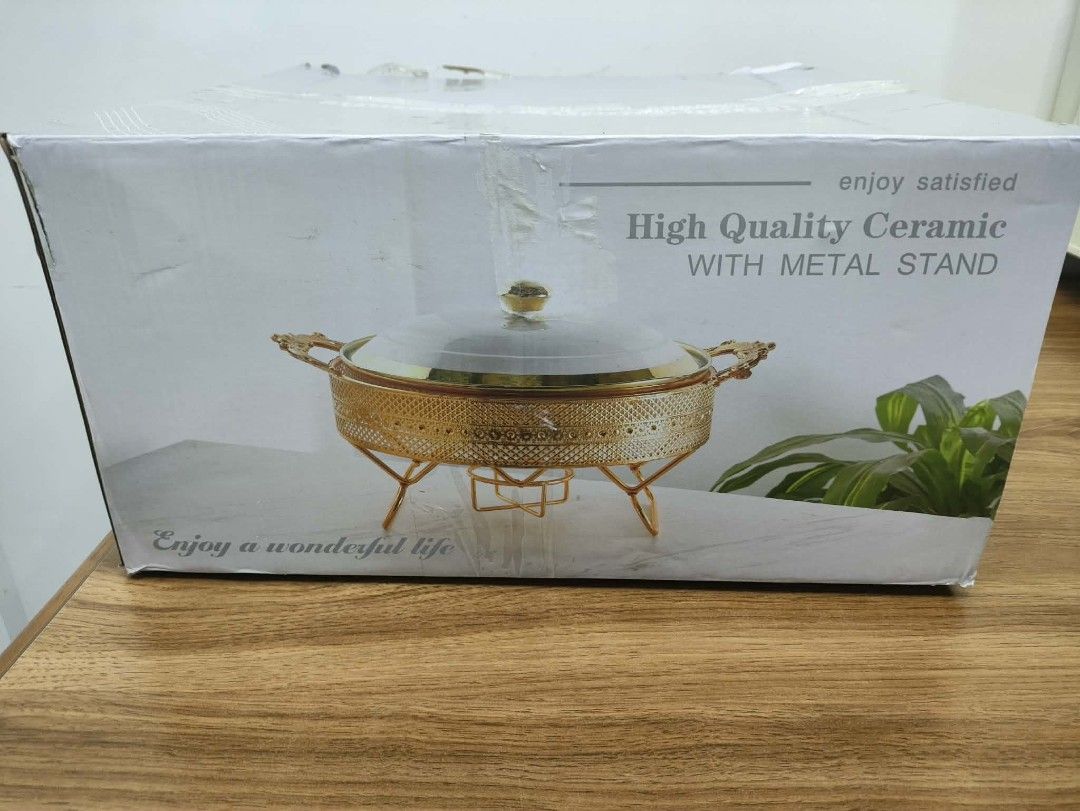 Chafing Dish (Category: Cookware & Accessories) located in Manila. Submitted by shellys_collection (Listing ID 1451650246, Image 2). Description: SANBO chafing dish for Sale Color: White & Gold Ceramic Quality: 9/10 (In Excellent Condition) Features: a metal stand with handles and a bottom burner for keeping food warm. Capacity: 4-7L Price: 500each (3pcs available) Ps. Open to VC for Quality and legit checking..