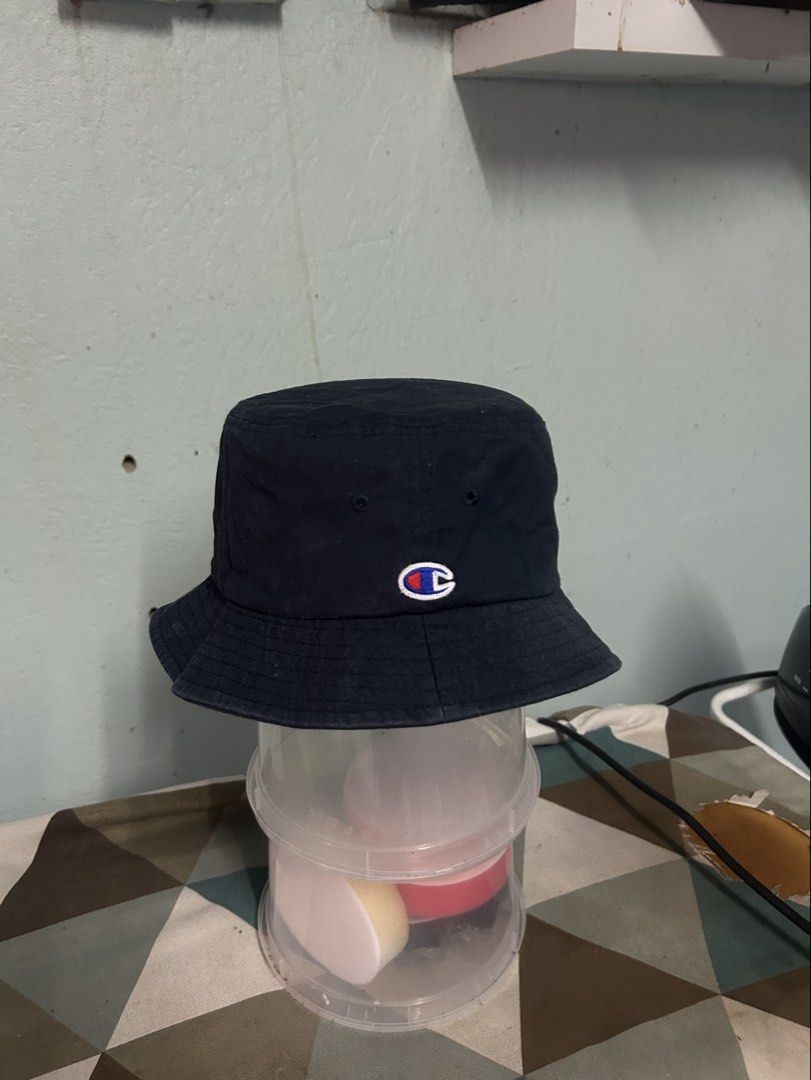 CHAMPION BUCKET HAT (Category: Cap & Hats) located in Kota Bharu. Submitted by lanz_bundle2 (Listing ID 1451564059, Image 1). Description: Size dewasa Condition 9/10 Warna biru.