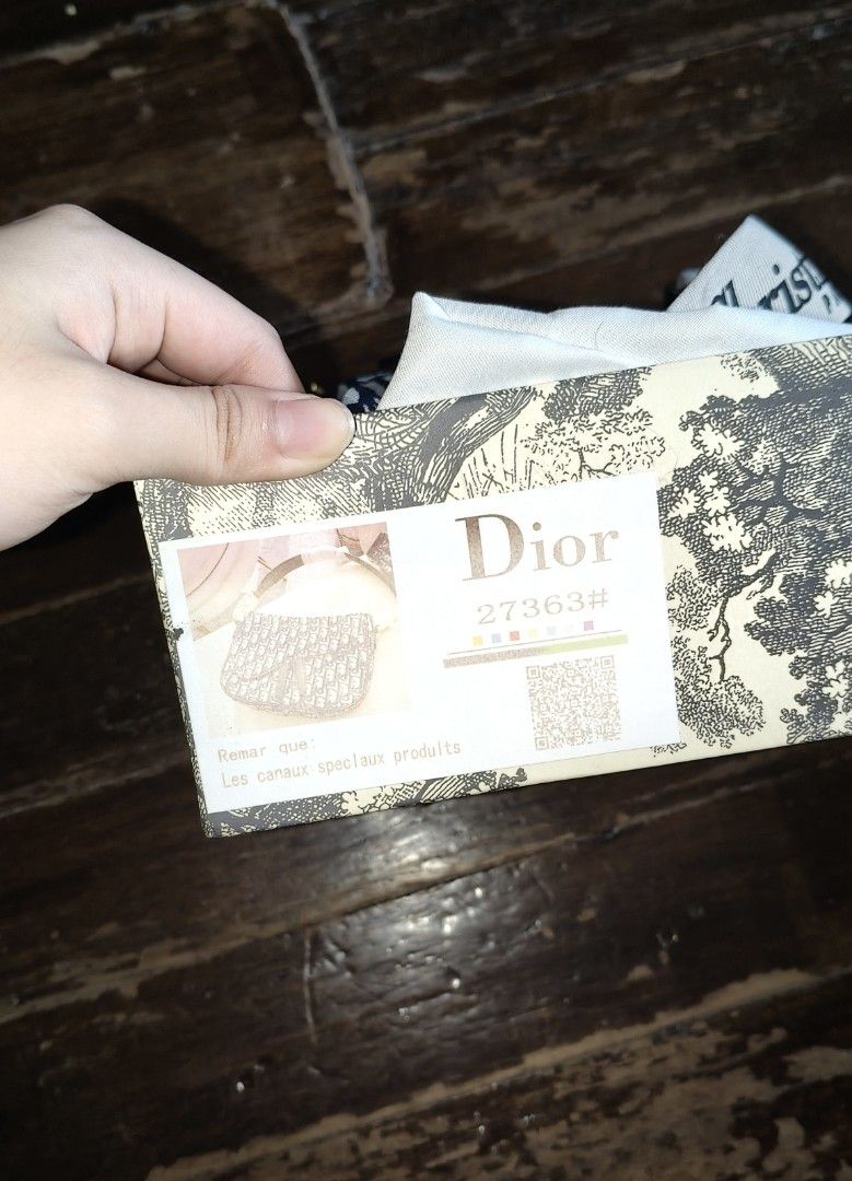Christian Dior saddle bag oblique canvas (Category: Luxury Bags & Wallets) located in Quezon City. Submitted by morningstar_52 (Listing ID 1451559640, Image 3). Description: - once used - may unting punit/sira sa may zipper - Iconic Oblique canvas - Detachable strap with 'Christian Dior' lettering - Gold-tone hardware - Includes original Dior box and dust bag - A classic addition to any collection.