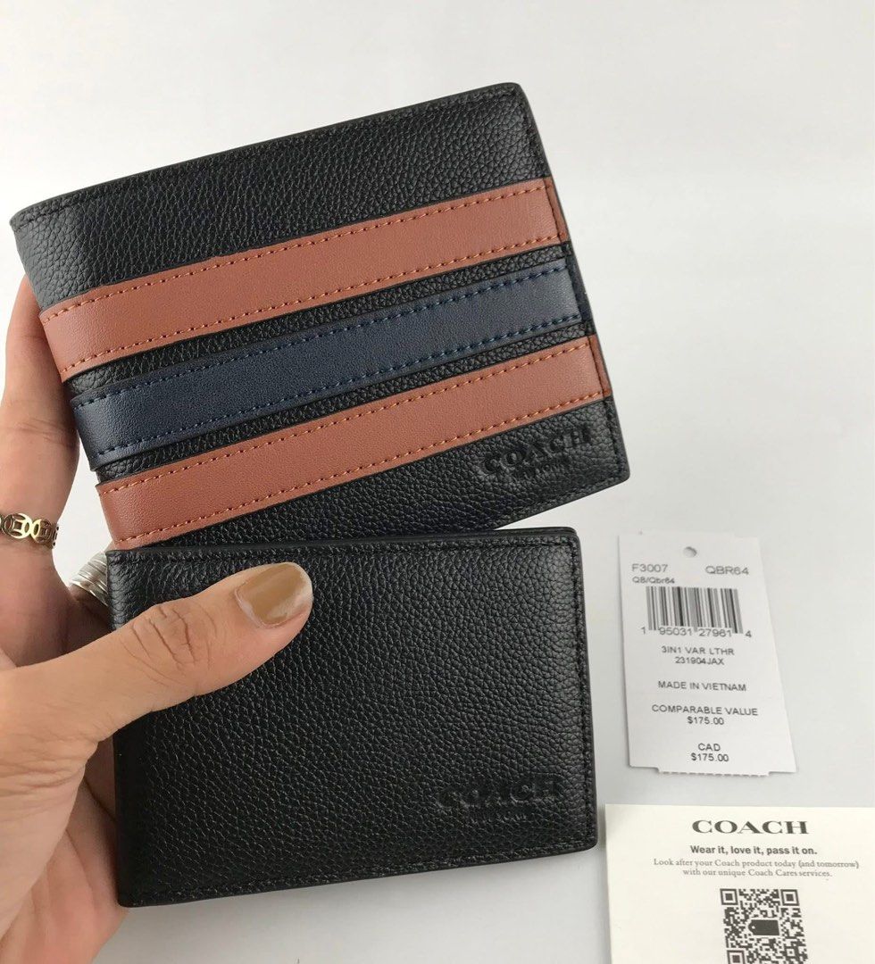 Coach Bifold Wallet - Black with Stripes (Category: Wallets & Card Holders) located in Caloocan City. Submitted by brandeditemsph (Listing ID 1451526814, Image 2). Description: Selling two Coach wallets. One is a classic black bifold. The other has black with brown and navy stripes. Both are made of leather. Comes with tags and authenticity card. Great gift idea or for yourself..