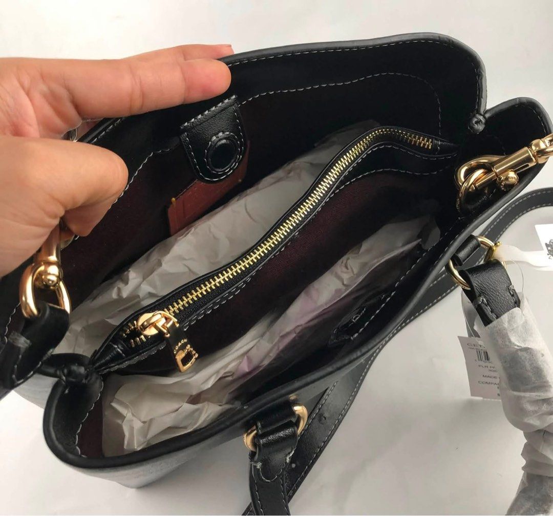 Coach CET29 Flt Print Acc Zip Tote Bag Black (Category: Tote Bags) located in Caloocan City. Submitted by brandeditemsph (Listing ID 1451528310, Image 3). Description: - Authentic Coach tote bag in classic black. - Versatile carrying options: top handles and a detachable crossbody strap. - Interior zip pocket for secure storage. - Comes with original tags. - Made in Vietnam. - Original comparable value: $295.00..