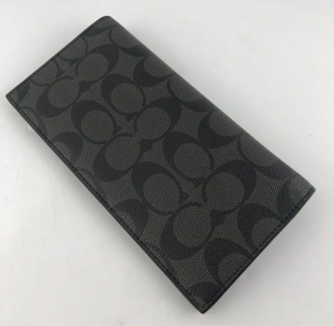 Coach Signature Long Wallet (Category: Wallets & Card holders) located in Caloocan City. Submitted by brandeditemsph (Listing ID 1451527597, Image 3). Description: - Coach long wallet - Signature print in black and grey - Ample card slots for organization - Zippered compartment for coins or small items - Clean interior - Ideal for keeping your essentials tidy.