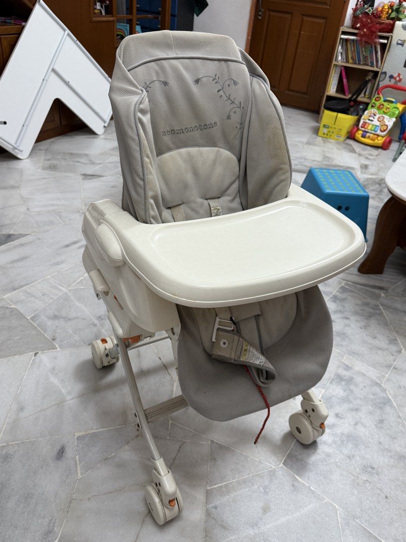Combi High Chair with Tray (Category: Baby High Chairs) located in Puchong. Submitted by jessiekhj (Listing ID 1451635445, Image 2). Description: - Combi high chair for easy feeding times - Adjustable height and tray for a perfect fit - Safety harness to keep your little one secure - Wheels for effortless movement around the house - Some minor wear on fabric and tray, but fully functional and ready for use.