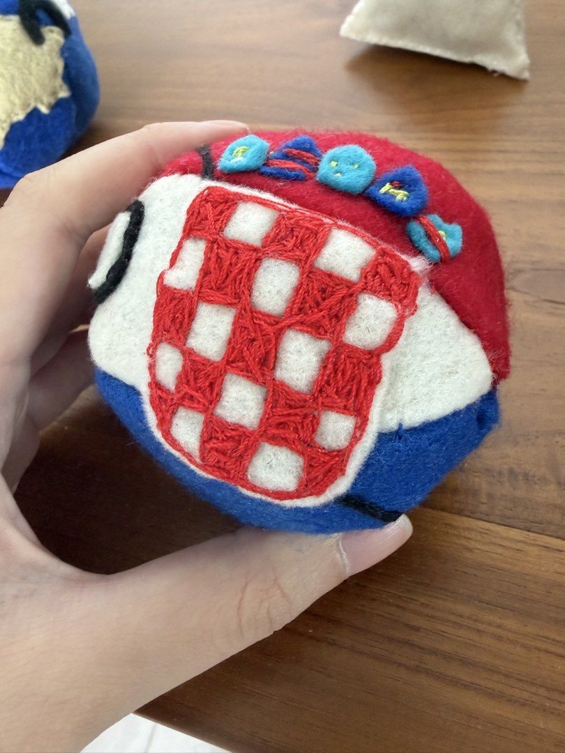 Custom Polandball Plush! (Category: Art & Prints) located in Singapore. Submitted by boggybeans (Listing ID 1451561247, Image 3). Description: Handmade Polandball plush! Photos are for reference only Dimensions: 8cm x 8cm x 8cm (for ball and triangle shapes) Material: Felt, recycled fabric (for inner stuffing) Pricing: Simple - $20 (eg. flags with simple elements, plain tricolour) Medium - $25 (eg. Kosovo, flags with more elements) Detailed - $35