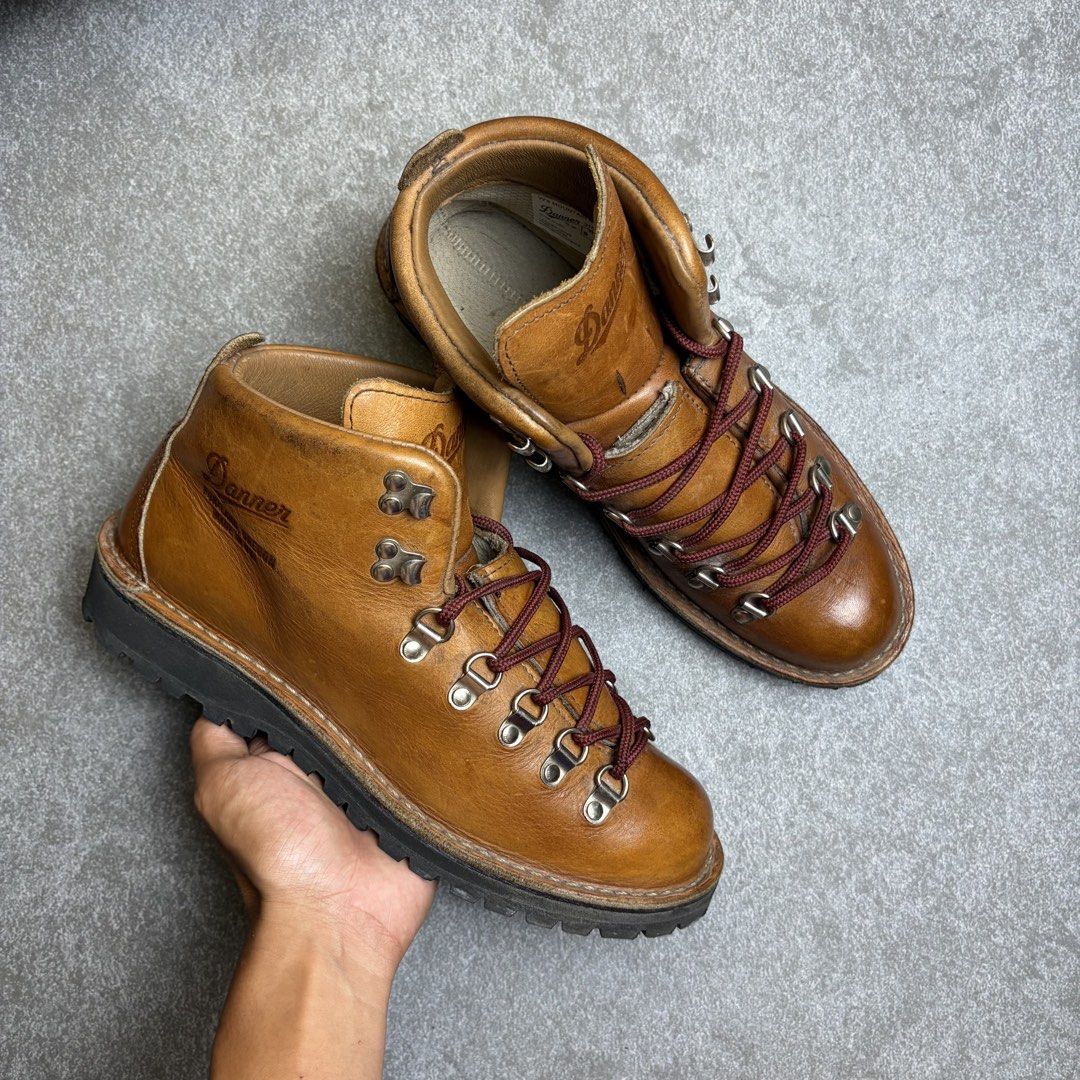 Danner Brown Leather Hiking Boots Vibram Sole (Category: Boots) located in Cagayan de Oro. Submitted by taramattsa45690 (Listing ID 1451597875, Image 1). Description: - Classic Danner hiking boots - Durable brown leather construction - Sturdy Vibram sole for excellent traction - Lace-up style with metal eyelets and speed hooks - Built for durability and adventure - Shows minor signs of wear consistent with use.