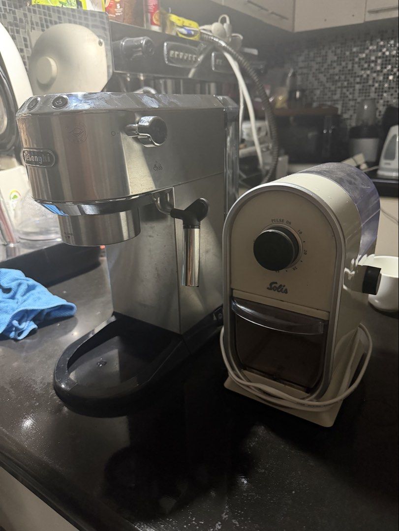 Delonghi Coffee Machine with Grinder (Category: Coffee Machines & Makers) located in Bulacan. Submitted by mysticdeer.6d7f47 (Listing ID 1451194628, Image 1). Description: Delonghi Dedica Ec680 Solis Fully Automatic Coffee Grinder 220V .