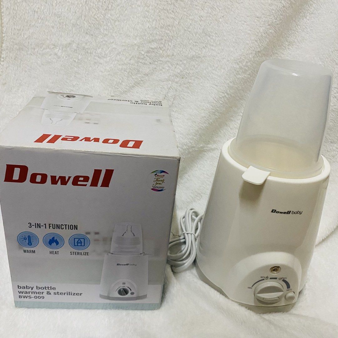Dowell Baby Bottle Warmer & Sterilizer BWS-009 (Category: Breastfeeding & Bottle Feeding) located in Manila. Submitted by srejuso (Listing ID 1451689875, Image 1). Description: - Dowell 3-in-1 Baby Bottle Warmer & Sterilizer - Functions: Warm, Heat, Sterilize - Ideal for busy parents - Includes original box - Easy-to-use controls.