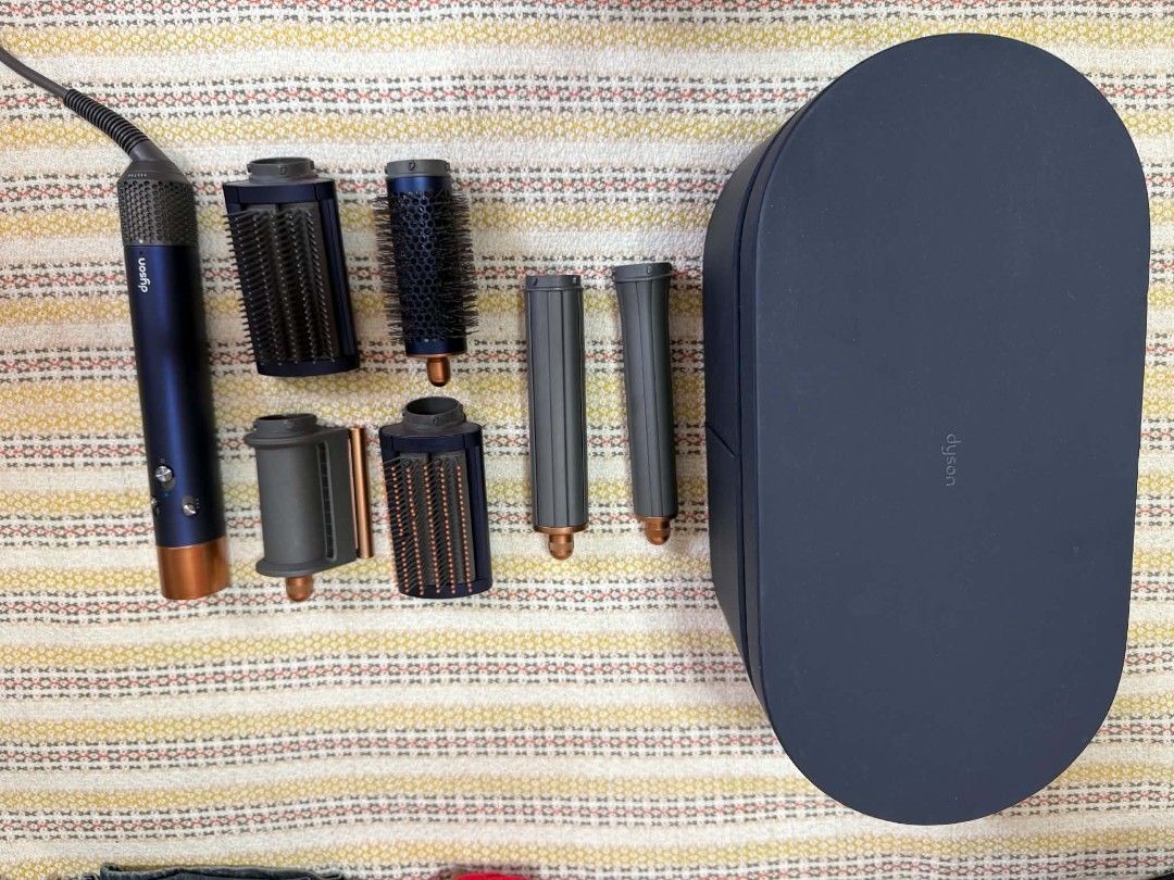 Dyson Airwrap 6 in 1 (Category: Hair) located in Lipa City. Submitted by trisaeb (Listing ID 1451565635, Image 1). Description: - owner works abroad, lightly used only - bought from the orange app - authentic/original dyson - purchased last dec 2025.
