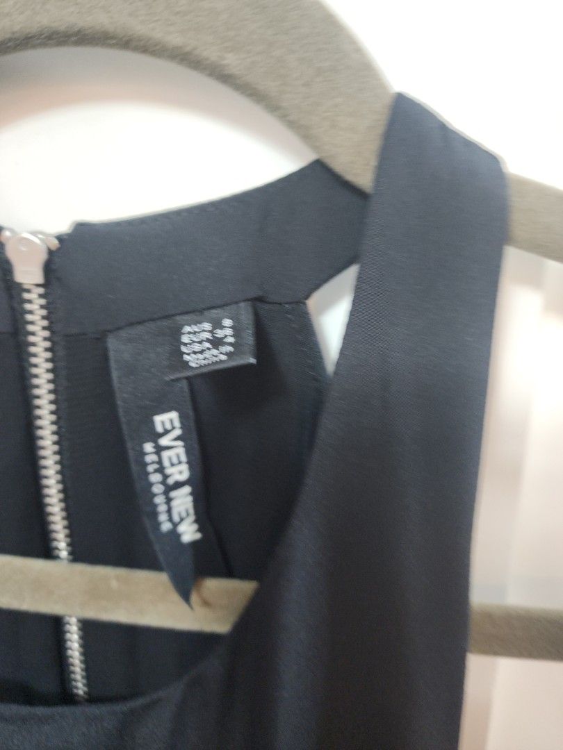 Ever New dress (Category: Dresses) located in Paranaque City. Submitted by declutterproject (Listing ID 1451639205, Image 3). Description: - Ever New Melbourne black peplum dress - Black bodice with a black and white striped skirt - Functional zipper down the front - Elasticated waist for a comfortable fit - Sleeveless design - Versatile for dressing up or down.