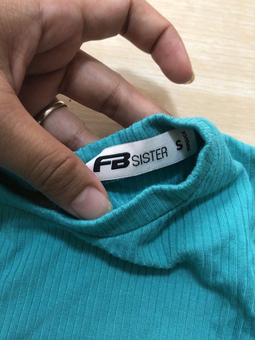 FB Sister ribbed open back with adjustable tie (Category: Others Tops) located in Urdaneta. Submitted by byells (Listing ID 1451558303, Image 3). Description: S on tag will fit Small - medium Teal color Stretchable Like new no issue.