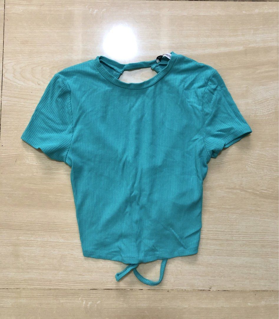FB Sister ribbed open back with adjustable tie (Category: Others Tops) located in Urdaneta. Submitted by byells (Listing ID 1451558303, Image 1). Description: S on tag will fit Small - medium Teal color Stretchable Like new no issue.