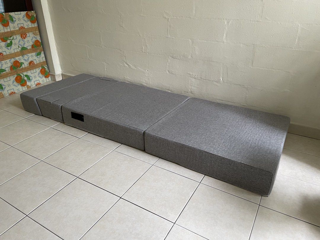 Foldable sofa bed (Category: Bedding & Towels) located in Singapore. Submitted by devoted88 (Listing ID 1451520128, Image 1). Description: Size: 70x50x20cm Lightly used. good condition (firm) Size : 70x15x20 cm Price @ $80 Cash deal only Self collect at 460013 .