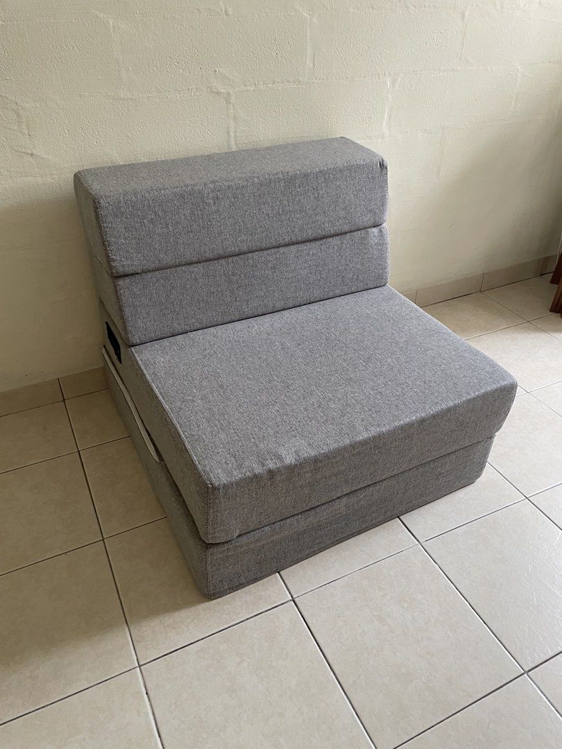 Foldable sofa bed (Category: Bedding & Towels) located in Singapore. Submitted by devoted88 (Listing ID 1451520128, Image 2). Description: Size: 70x50x20cm Lightly used. good condition (firm) Size : 70x15x20 cm Price @ $80 Cash deal only Self collect at 460013 .