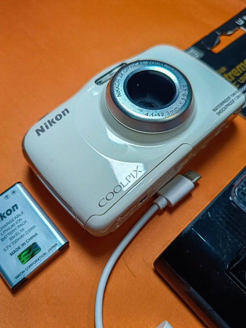 For Sale Nikon COOLPIX S33 Waterproof Camera (Category: Cameras) located in Cebu City. Submitted by johnearl15 (Listing ID 1451665984, Image 2). Description: Nikon COOLPIX S33 Waterproof Camera 📸 Take all for 6k Only 📸 ✅ Waterproof up to 10m (33ft) ✅ Shockproof up to 1.5m (5ft) ✅ Original Nikon battery included ✅ Universal charger included ✅ USB OTG SD card reader included ✅ Clean and well-maintained ✅ Brand-new 16GB SD CARD 📍Ready to use—just