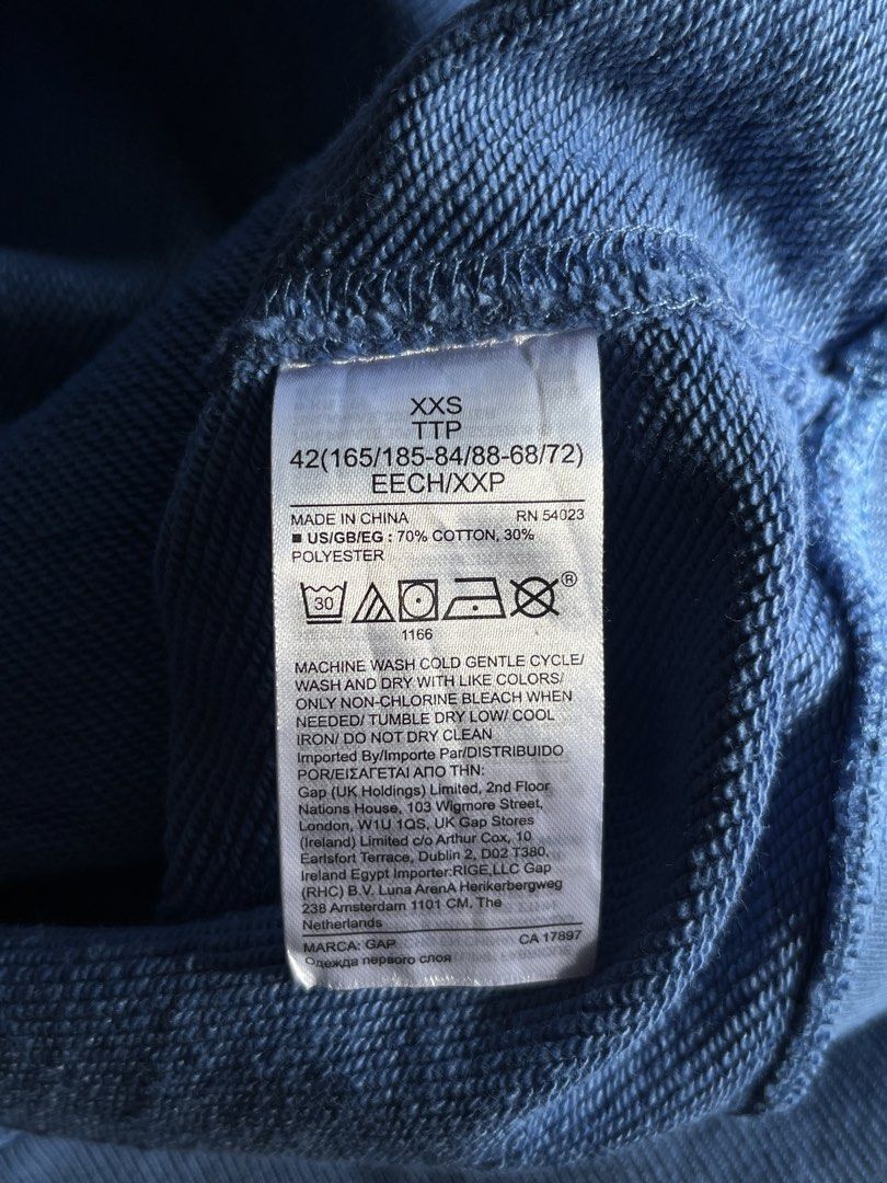 GAP Blue Hoodie (Category: Hoodies) located in Davao. Submitted by gotchastuff (Listing ID 1451593345, Image 3). Description: - Blue GAP hoodie - Size XXS - Dimes 20.5x26 - Material: 70% cotton, 30% polyester - Ideal for casual wear - Care Instructions: Cold gentle wash, do not bleach or tumble dry, iron on low heat if needed. Refer to care label for full details..