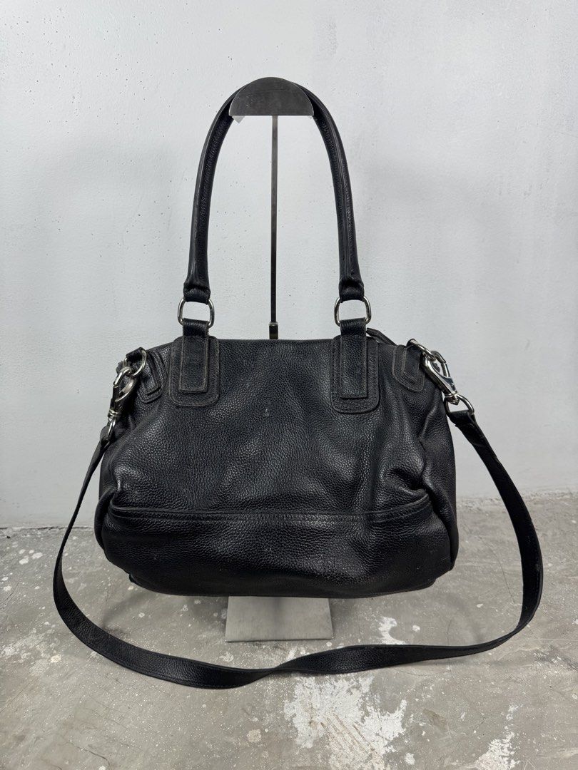 Givenchy two way bag (Category: Luxury Bags & Wallets) located in Quezon City. Submitted by streetgallerygarments (Listing ID 1451676796, Image 2). Description: Givenchy pandora Condition:9/10 Issue:need cleaning and minimal sign of usage Shipping Jnt/lalamove Authentic not guarented Please check before purchasing thankyou.