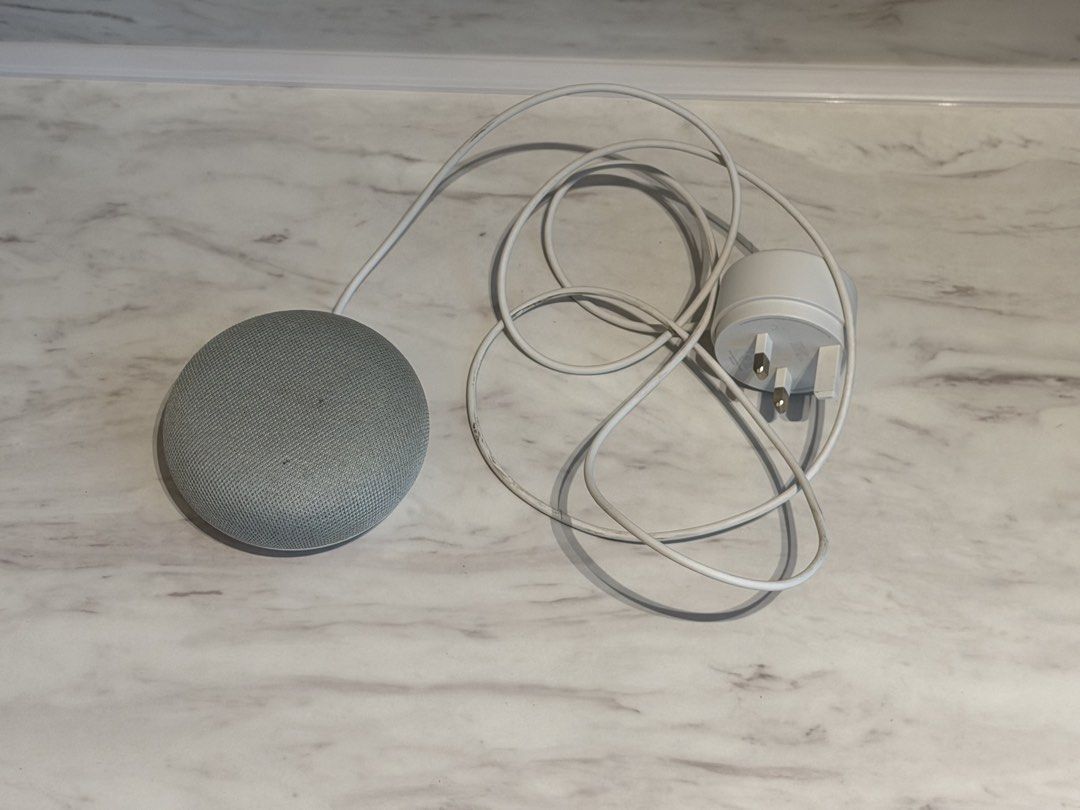 Google Mini (Category: Soundbars, Speakers & Amplifiers) located in Singapore. Submitted by leilongleilong88 (Listing ID 1451648286, Image 1). Description: - Google Nest Mini - Colour: Charcoal - Voice control with Google Assistant - Features: Play music, answer questions, control smart home devices - Includes: Power adapter and cable .