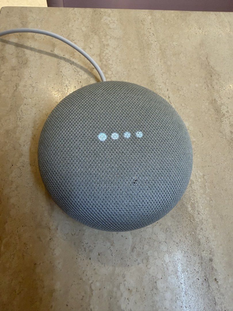 Google Mini (Category: Soundbars, Speakers & Amplifiers) located in Singapore. Submitted by leilongleilong88 (Listing ID 1451648286, Image 2). Description: - Google Nest Mini - Colour: Charcoal - Voice control with Google Assistant - Features: Play music, answer questions, control smart home devices - Includes: Power adapter and cable .