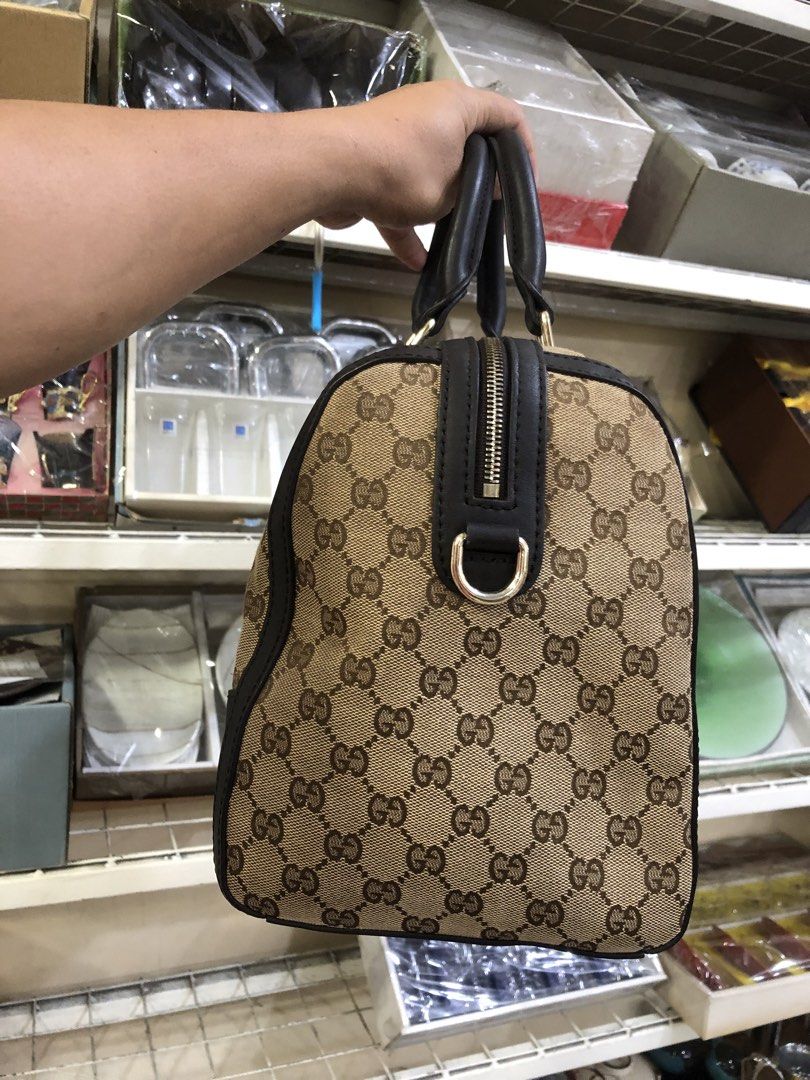 GUCCI BAG (Category: Tote Bags) located in Manila. Submitted by beyondessence (Listing ID 1451622865, Image 3). Description: Gucci Vintage Web Bee Boston Bag crafted in signature GG canvas with a green and red web stripe and a gold-tone bee motif..