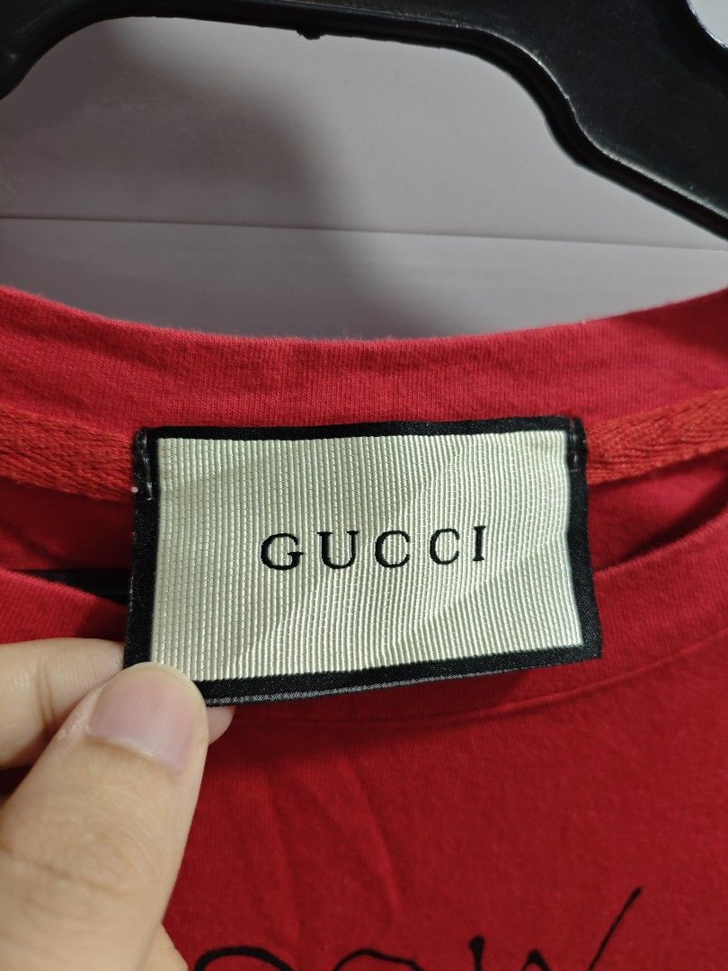 Gucci Red Graphic Unisex Tshirt (Category: Tshirts & Polo Shirts ) located in Baguio. Submitted by cool_chic (Listing ID 1451547226, Image 2). Description: Gucci Red Graphic Unisex Tshirt Color Rate 9.8/10 Like New No Flaws Complete Tags Cotton Tela Machine Washed Size Large Dimes 21 Width 26 Length Price P359.