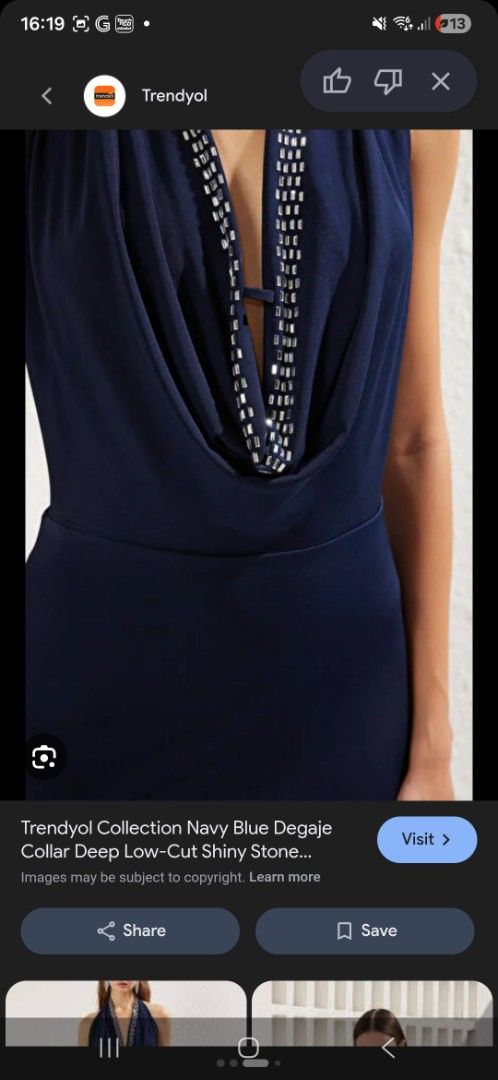 Halter Neck Evening dress (Category: Dresses) located in Petaling Jaya. Submitted by jellen_closet (Listing ID 1451569148, Image 2). Description: - Navy blue maxi dress from Trendyol - Halter neck with a deep low-cut front - Embellished neckline with shiny stones - Open back design - Floor length - Ideal for formal events or parties.