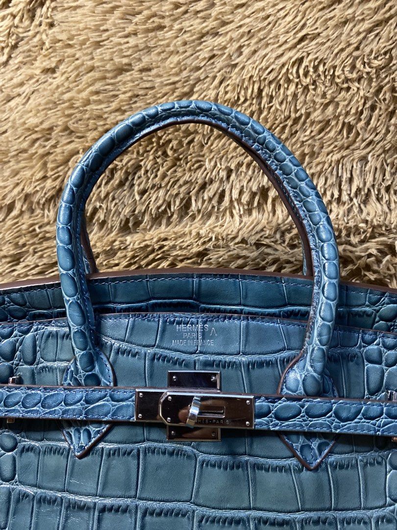 Hermes Birkin crocodile (Category: Luxury Bags & Wallets) located in Bacolod City. Submitted by SweetieThings_0929 (Listing ID 1451696944, Image 2). Description: Birkin handbag in a vibrant teal-blue exotic crocodile leather Palladium Hardware One zipper pocket inside One open pocket inside.