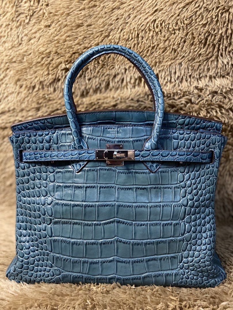 Hermes Birkin crocodile (Category: Luxury Bags & Wallets) located in Bacolod City. Submitted by SweetieThings_0929 (Listing ID 1451696944, Image 1). Description: Birkin handbag in a vibrant teal-blue exotic crocodile leather Palladium Hardware One zipper pocket inside One open pocket inside.