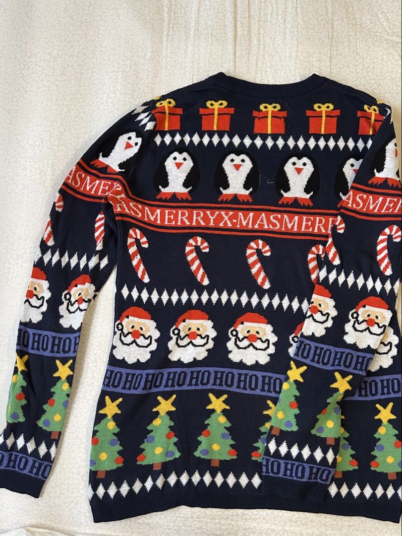 H&M Navy Blue Christmas Sweater (Category: Coats, Jackets and Outerwear) located in Cainta. Submitted by gamityen (Listing ID 1451554070, Image 3). Description: Fits XS/S - Navy blue H&M Christmas sweater - Knitted penguins, Santa Claus, candy canes, and Christmas trees - Barely worn RFS: Decluttering closet 💸 MOP: GCash, BPI, or Maya 📍 SHIPPING: Lalamove or Grab No returns or refunds; strictly sold as-is. Feel free to PM for inquiries :).