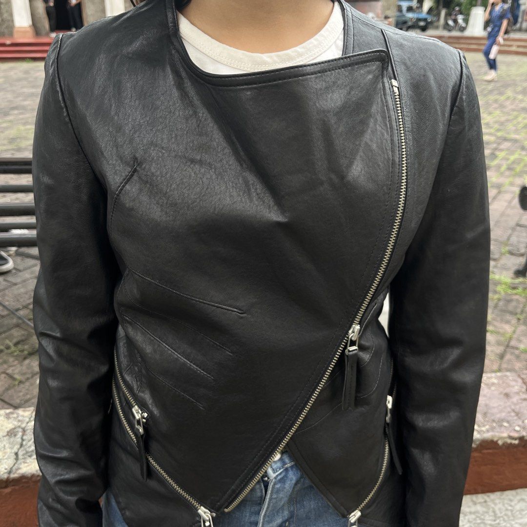 Indibuni Womens Biker Leather Jacket (Category: Coats, Jackets and Outerwear) located in Marikina City. Submitted by wayupcollective (Listing ID 1451623787, Image 2). Description: Indibuni Womens Biker Leather Jacket Size L on tag (refer to measurements) Good as new Genuine leather No flaws Measurement Length: 24” Width: 18” Chest: 14” Shoulder: 15” Sleeve: 24” Sleeve hem: 8”.