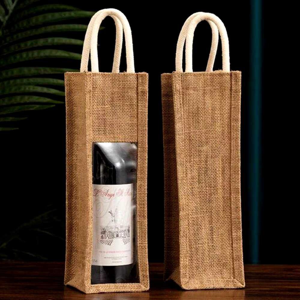 Jute Wine Bottle Bag with Window - Single/Double Bottlei (Category: Water Bottles & Tumblers) located in Manila. Submitted by joan20001 (Listing ID 1451570772, Image 1). Description: - Jute wine bottle bags with a clear window to showcase your bottle. - Ideal for gifting or convenient carrying. - Features sturdy, comfortable handles. - Available in single and double bottle sizes. - Perfect for parties, celebrations, and special occasions..