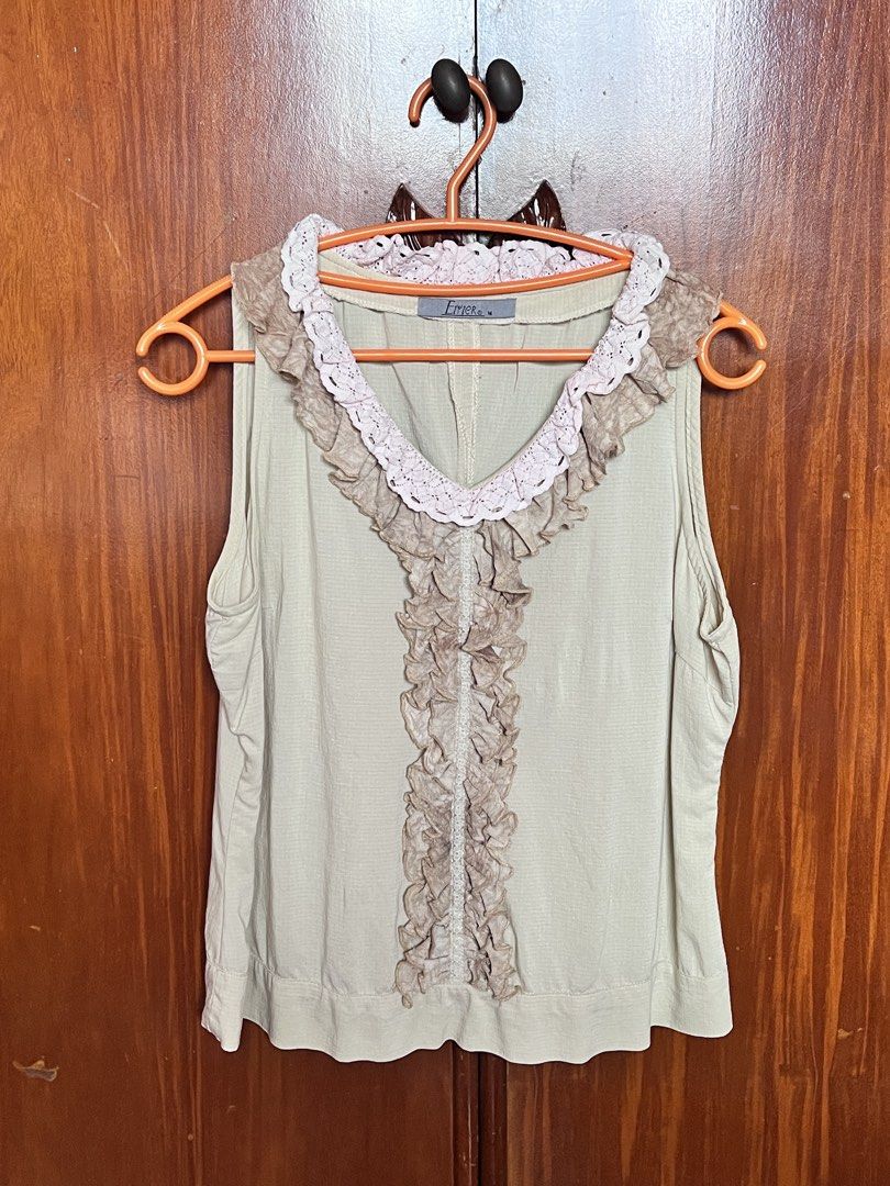 Flowy Khaki Sleeveless Blouse Top (Category: Sleeveless) located in Manila. Submitted by celestial111 (Listing ID 1451566666, Image 1). Description: .