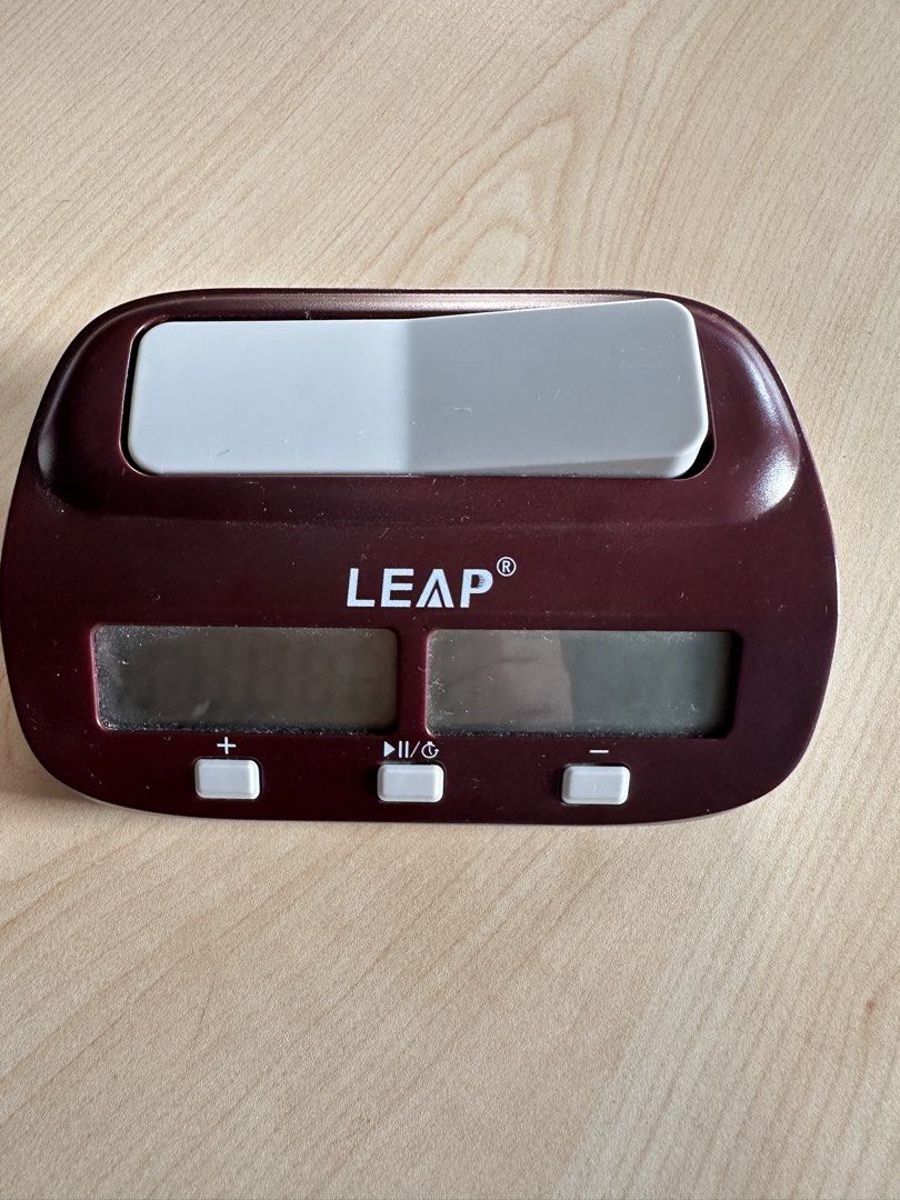 LEAP Chess Clock Timer (Category: Kids Toys) located in Singapore. Submitted by sephora7 (Listing ID 1451519702, Image 1). Description: - LEAP digital chess clock - Clear digital display for both players - Convenient pause/play button - +/- buttons for easy adjustments - Ideal for chess games - Simple setup and operation.