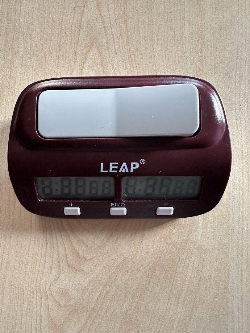 LEAP Chess Clock Timer (Category: Kids Toys) located in Singapore. Submitted by sephora7 (Listing ID 1451519702, Image 2). Description: - LEAP digital chess clock - Clear digital display for both players - Convenient pause/play button - +/- buttons for easy adjustments - Ideal for chess games - Simple setup and operation.