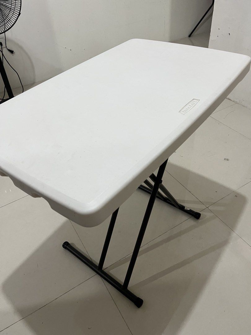 Lifetime White Folding Table 26x18 (Category: Tables & Sets) located in Manila. Submitted by swiftwater-d541 (Listing ID 1451630242, Image 2). Description: - Lifetime folding table, 26x18 in. - Ideal for events, parties, or as an extra workspace. - Durable plastic top with a sturdy metal frame. - Legs fold for convenient and easy storage. - Ready for its new home!.
